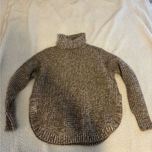 White and brown turtle neck sweater